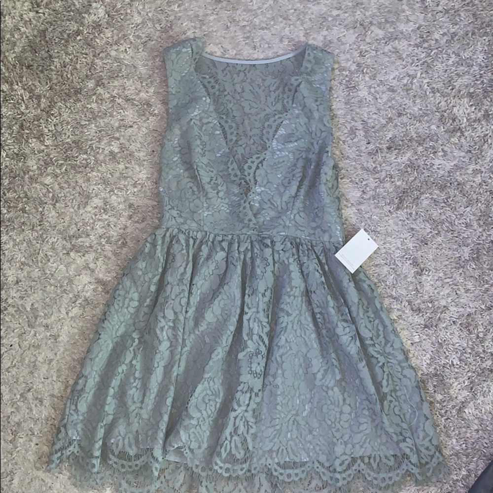 Teal/faded green lace dress
